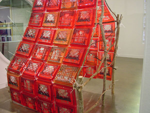 Tarkowski'sMilk Crate Shack, 2002, sticks and photo screen print on vacuum formed plastic, 87 x 66 x 60